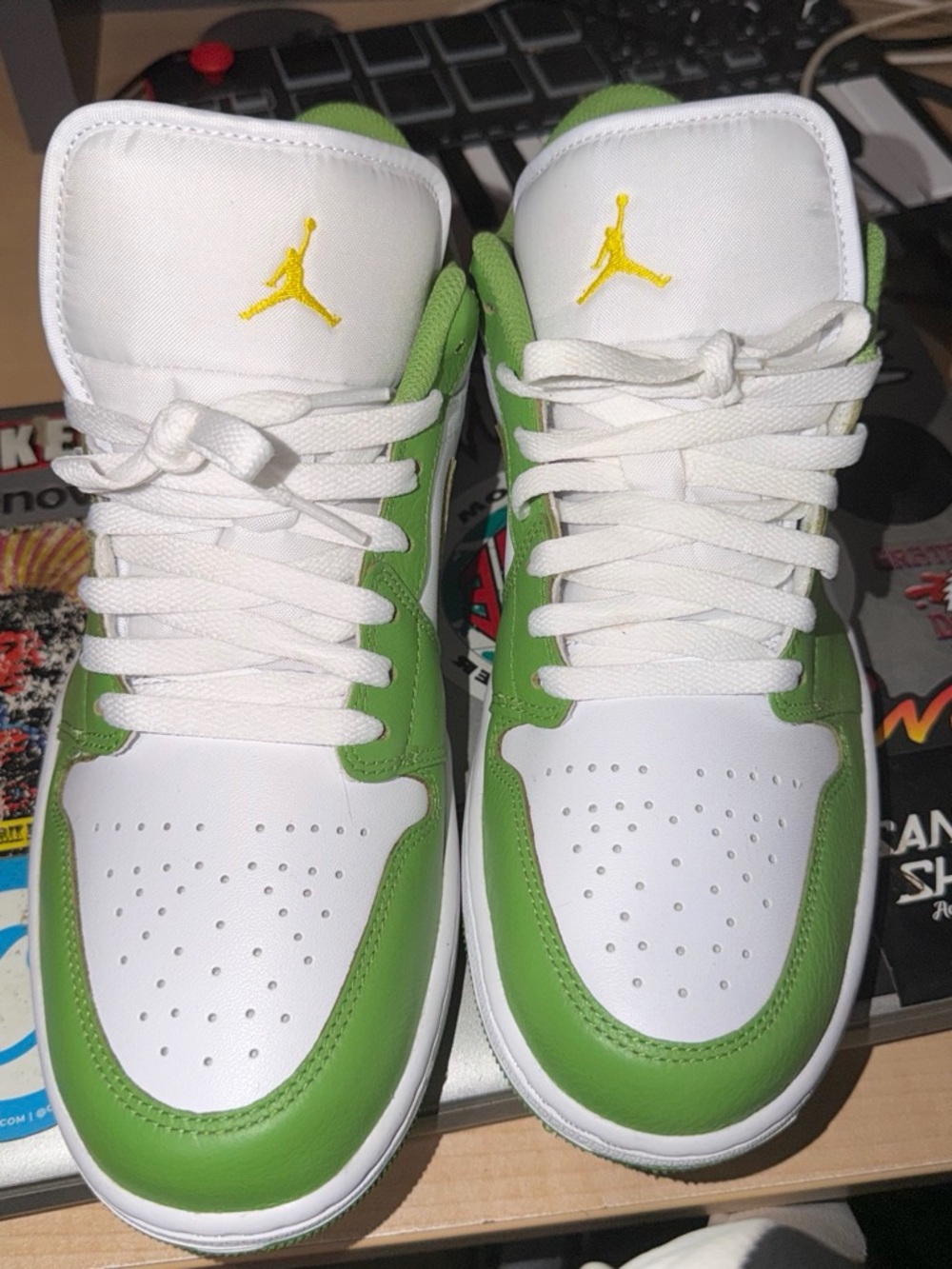 Nike Jordan 1  SE White and Green Low-Top Sneakers with Yellow Logo